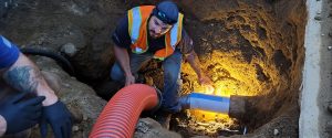Technician Repairing Sewer Pipe Wilmington, MA